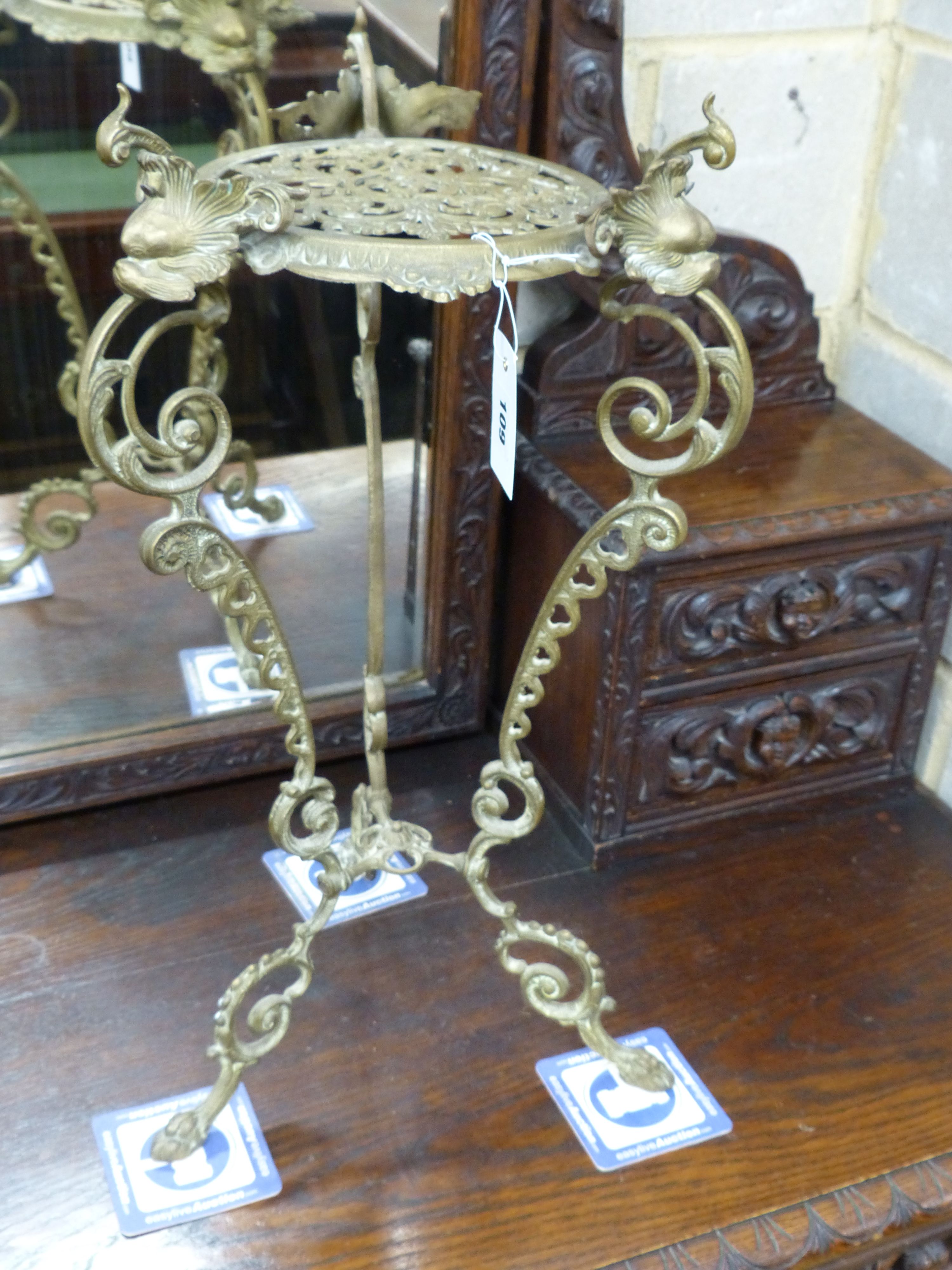 A cast brass jardiniere stand, height 60cm